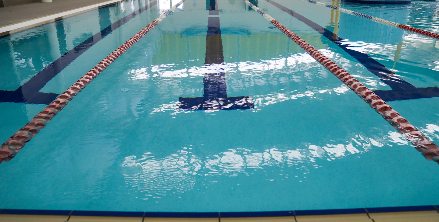 A low level shot of a swimming lane within the 25m indoor pool at Arena Joondalup