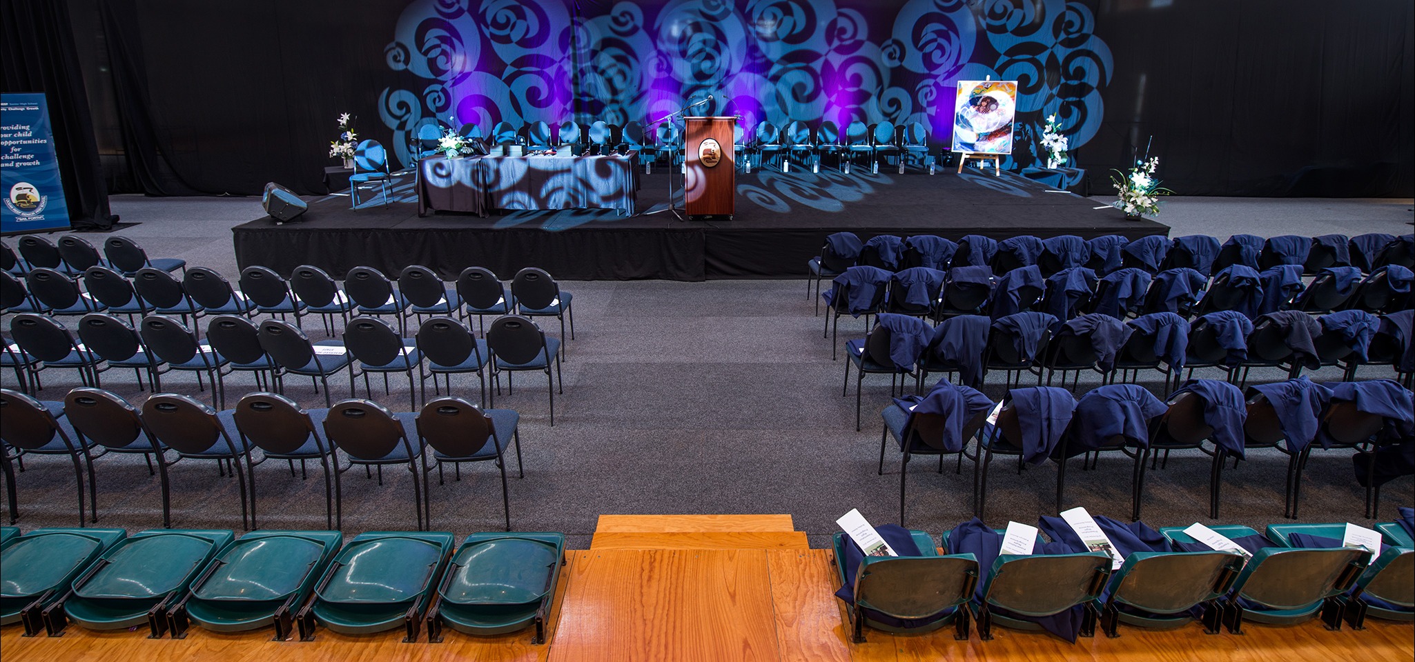 A photo of a function room set up to host a school graduation