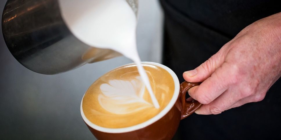 Coffee being poured into a mug