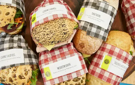 Aphotoofacollectionofrollsandsandwiches