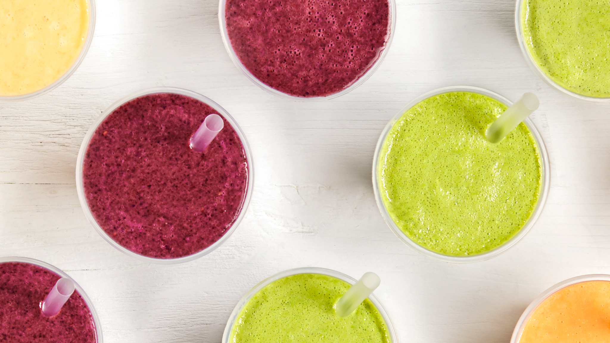 Atopdownphotoofdifferentjuicesandsmoothies