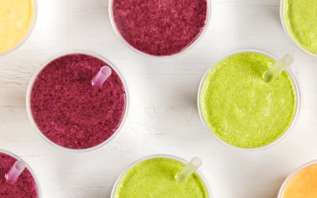 Atopdownphotoofdifferentjuicesandsmoothies