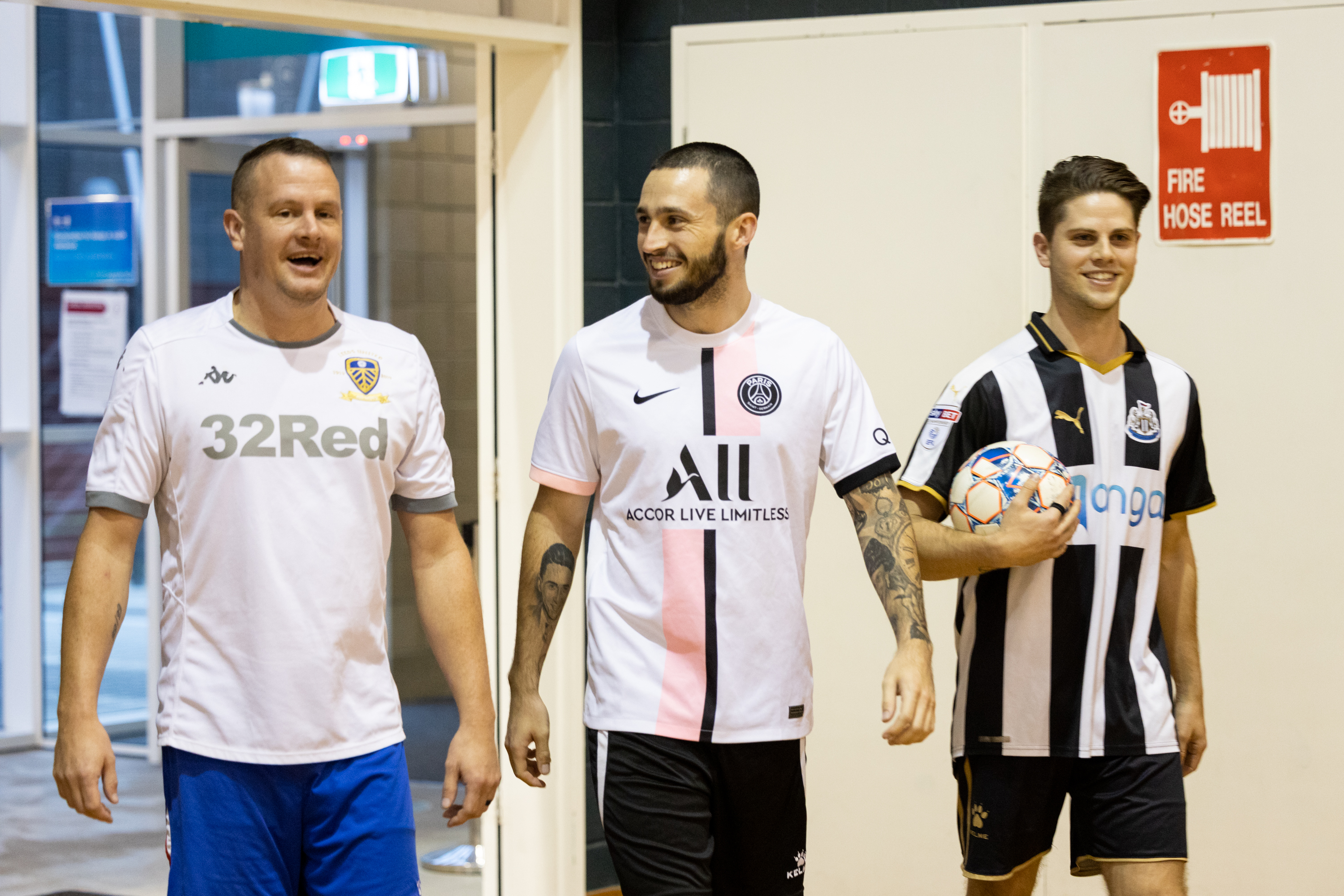 Men's futsal players arriving for the game
